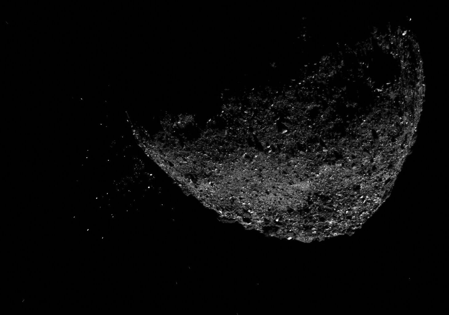 Asteroid Bennu ejecting particles.