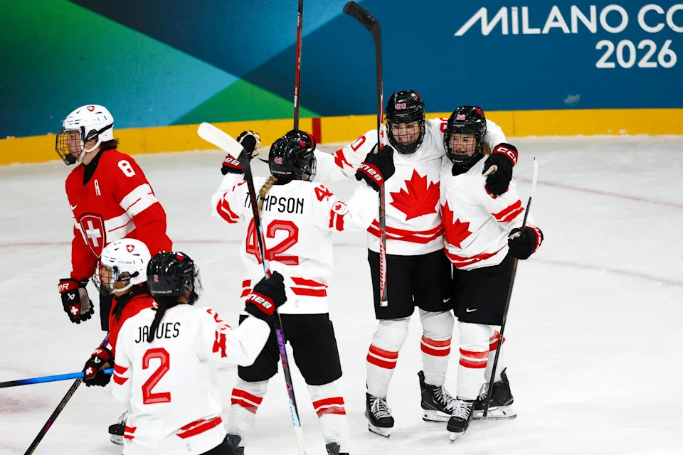 Milano Cortina 2026 Olympics - Ice Hockey - Women's Preliminary Round - Group A - Switzerland vs Canada - Milano Rho Ice Hockey Arena, Milan, Italy - February 07, 2026. Daryl Watts of Canada celebrates scoring their fourth goal against Switzerland with Claire Thompson of Canada and Sarah Nurse of Canada REUTERS/Alessandro Garofalo