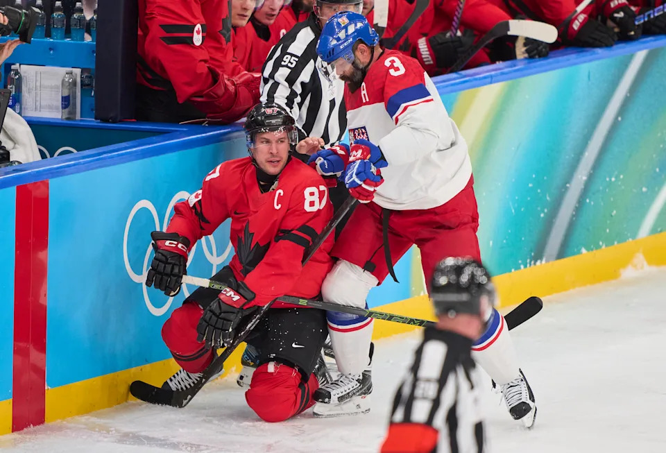 MILAN, ITALY - FEBRUARY 18: Sidney Crosby of Canada injured in a check of Radko Gudas CZE 3 during the Men's Ice Hockey Quarterfinal match between Canada and Czechia on day twelve of the Milano Cortina 2026 Winter Olympic games at Milano Santagiulia Ice Hockey Arena on February 18, 2026 in Milan, Italy. (Photo by EyesWideOpen/Getty Images)