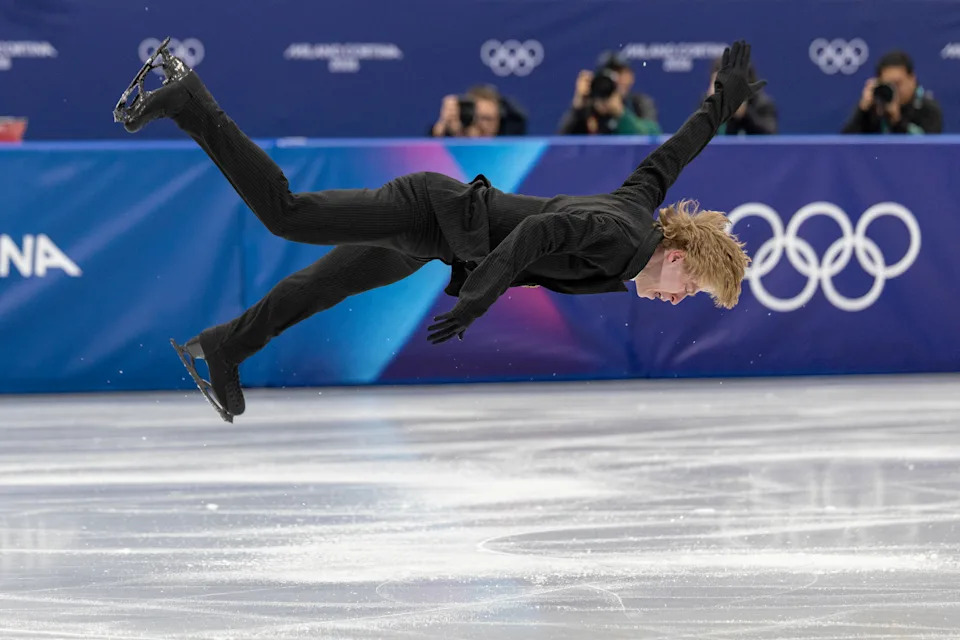 MILAN, ITALY - February 07:  Stephen Gogolev of Canada performs his routine during the Figure Skating, Team Event, Men's Single Skating - Short Program routine at the Milano Ice Skating Arena at the Milano Cortina Winter Olympic Games 2026 on February 7th, 2026 in Milan, Italy.  (Photo by Tim Clayton/Getty Images)
