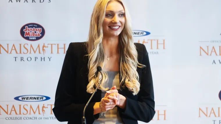 WNBA’s Cameron Brink flaunts chiseled abs in a very not-for-office bra top suit image