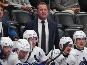 Vancouver Canucks head coach Adam Foote looks on from the team bench in a Dec. 2, 2025, game in Denver.