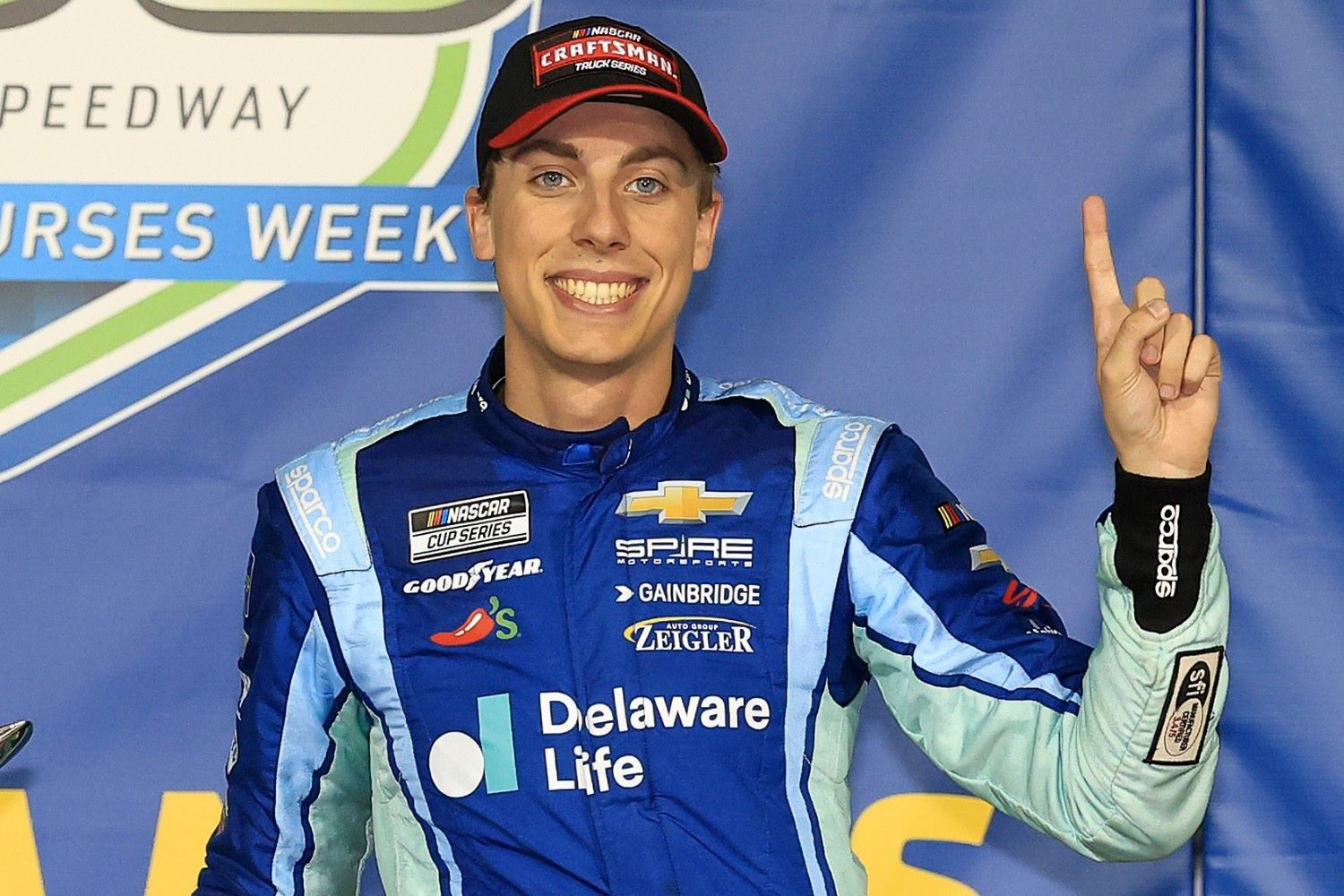 Carson Hocevar, driver of the #7 Delaware Life Chevrolet, celebrates in victory lane after winning the NASCAR Craftsman Truck Series Heart of Health Care 200 at Kansas Speedway on May 10, 2025 in Kansas City, Kansas. (Photo by Chris Graythen/Getty Images)