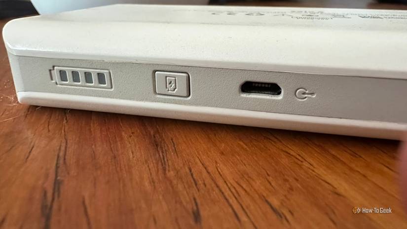 Closeup of an old power bank with micro-usb connector.