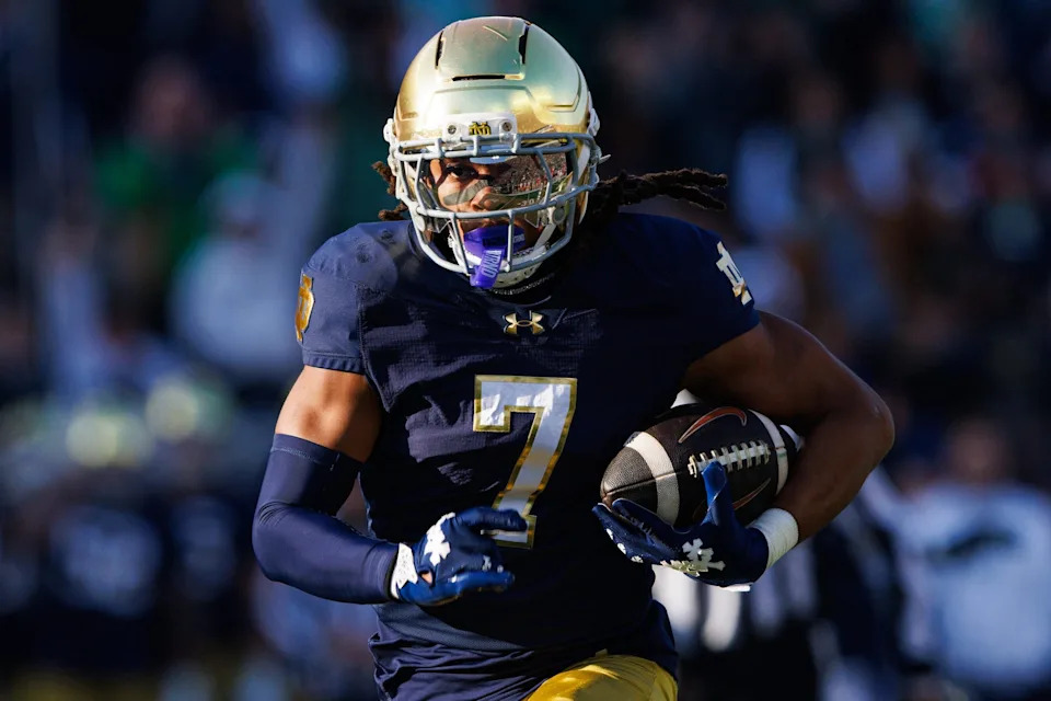 Notre Dame safety Jalen Stroman returns an interception for a touchdown in the first half of a NCAA football game against Syracuse at Notre Dame Stadium on Saturday, Nov. 22, 2025, in South Bend.