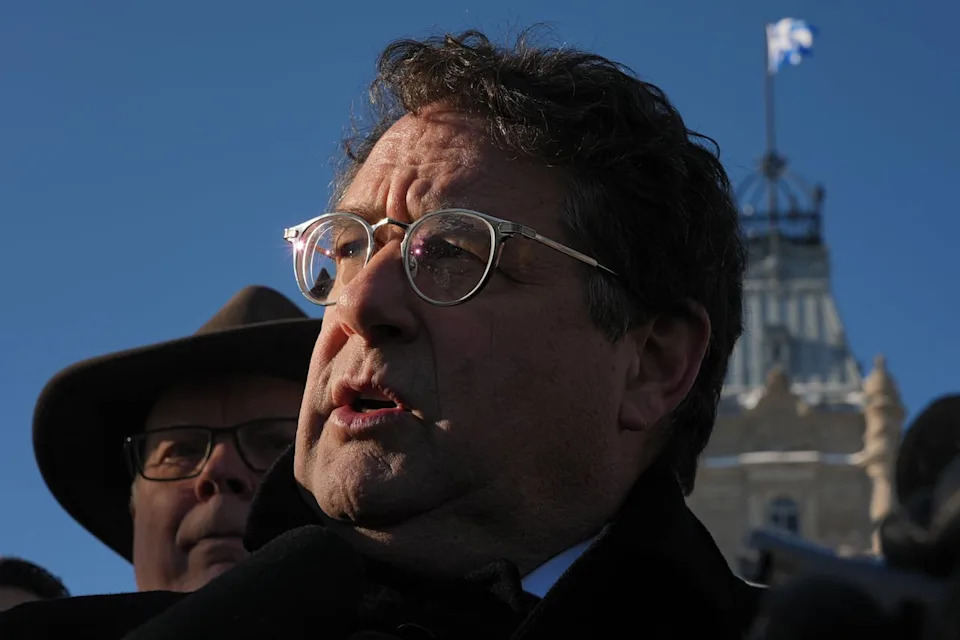 Bernard Drainville, CAQ leadership candidate, speaks outside Quebec's National Assembly on Feb. 19, 2026.