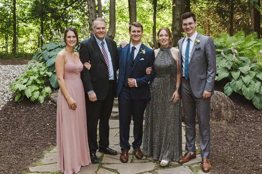 "This experience changed me for the better and made me a lot more thankful for things in life," says Doug Munro, second from left, pictured here with his wife Barbara Munro, second from right, and their three children. (Photo submitted by Doug Munro)