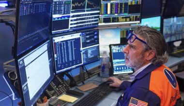 US stocks sink and oil prices rise as worries about AI, inflation and possible war hit Wall Street