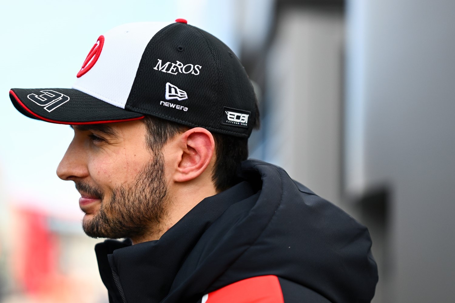 Esteban Ocon of France and Haas F1 looks on in the Paddock during day one of F1 Testing at Circuit de Catalunya on January 26, 2026 in Montmelo, Spain. (Photo by Guido De Bortoli/LAT Images for Haas)