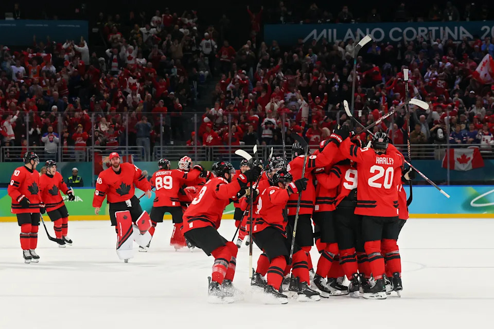MILAN, ITALY - FEBRUARY 18: Players of Team Canada celebrate the team's 4-3 overtime victory in the Men's Quarterfinals Playoff match between Canada and Czechia on day 12 of the Milano Cortina 2026 Winter Olympic games at Milano Santagiulia Ice Hockey Arena on February 18, 2026 in Milan, Italy. (Photo by Bruce Bennett/Getty Images)