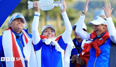 Bronte Law holds aloft the Solheim Cup after helping Europe defeat the United States in 2019