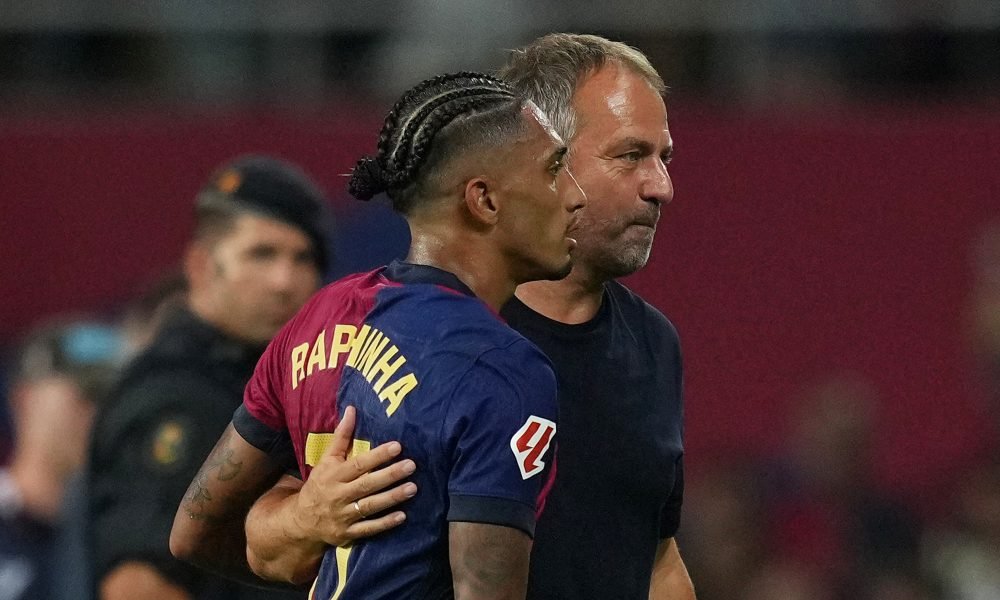 Raphinha and Hansi Flick of FC Barcelona