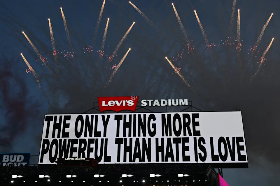 Toward the end of his set, a message on the big screen read: ‘The only thing more powerful than hate is love’ (AFP/Getty)