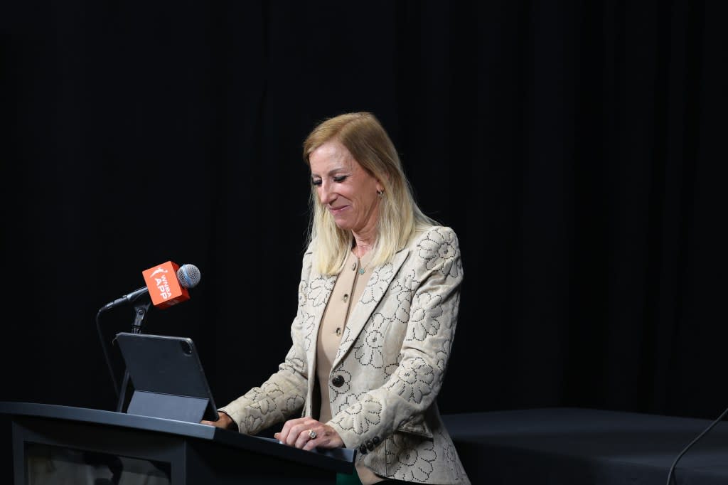 WNBA Commissioner Cathy Engelbert presents 2025 WNBA Coach of the Year award during round 1 game 2 on September 17, 2025 at SAP Center in San Jose, California. NBAE via Getty Images
