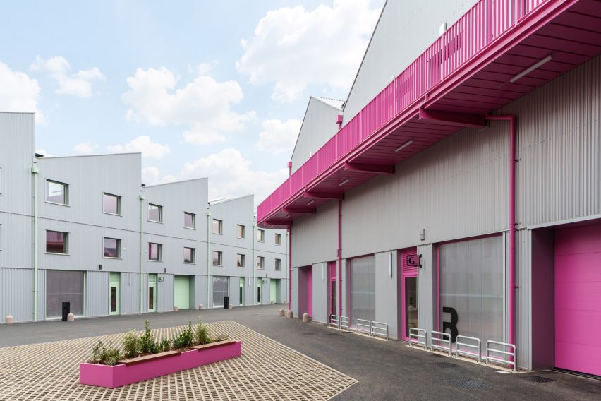 Florentia Village Turner Works steel structures with sawtooth roofs