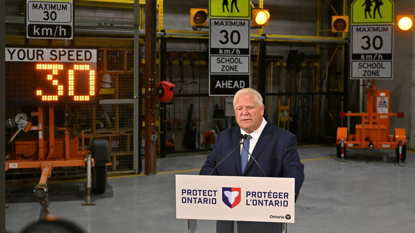 Doug Ford speaking at a press conference about road safety measures in Toronto.