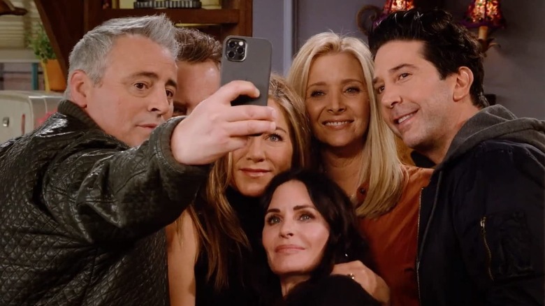 The cast of Friends take a group selfie on Friends: The Reunion.