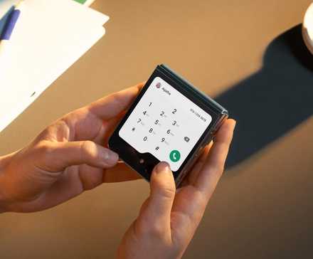 Holding up a Galaxy Z Flip 6 cover screen while using the dialer app