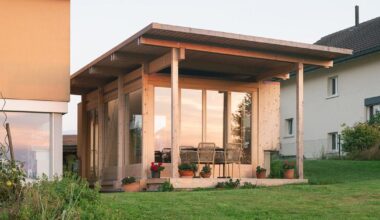 timber garden folly pavilion transitions between resting shelter and planted patio