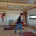 Courtesy of District Development Unit Ger Plug-In 3.0 / District Development Unit - Interior Photography, Wood, Stairs, Bed