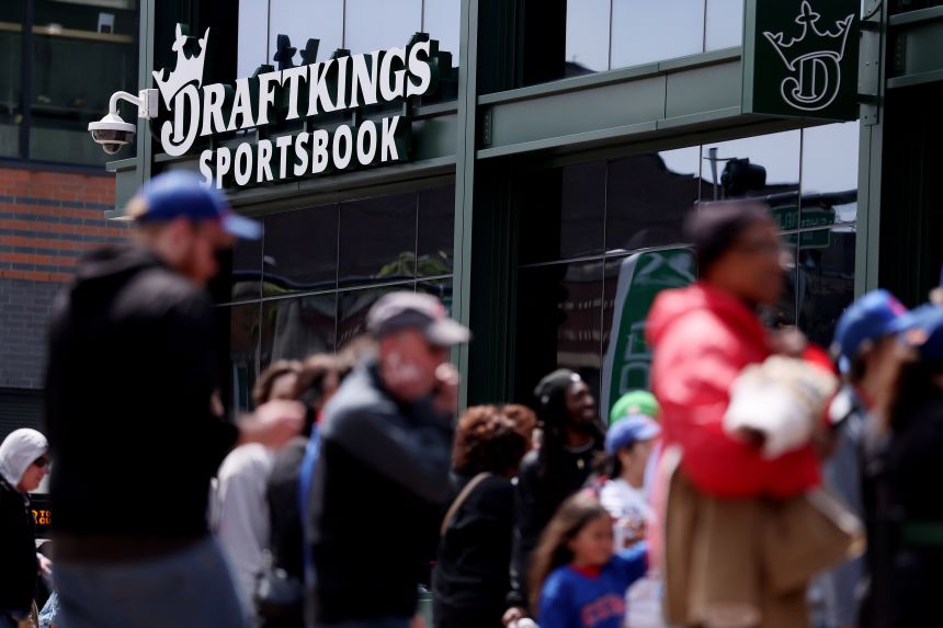 A DraftKings Sportsbook ad is seen outside Wrigley Field in Chicago before a Cubs game in May.