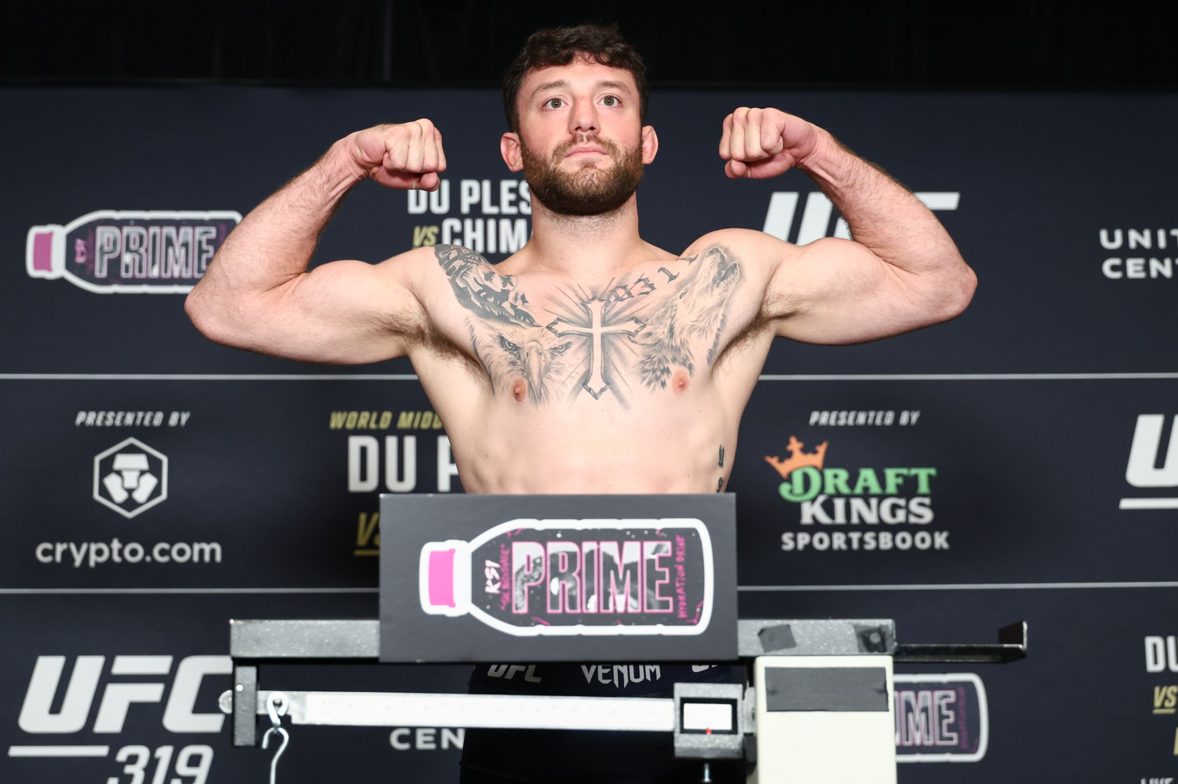CHICAGO, ILLINOIS - AUGUST 15: Eric Nolan poses on the scale during the UFC 319 official weigh-in at Voco Chicago Downtown on August 15, 2025 in Chicago, Illinois. (Photo by Ed Mulholland/Zuffa LLC)
