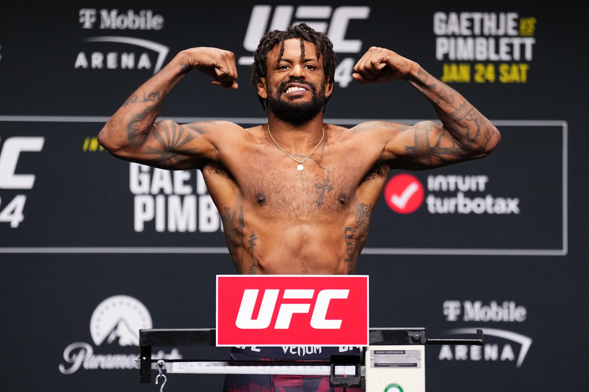 LAS VEGAS, NEVADA - JANUARY 23: Michael Johnson poses on the scale during the UFC 324 official weigh-in at T-Mobile Arena on January 23, 2026 in Las Vegas, Nevada. (Photo by Jeff Bottari/Zuffa LLC)