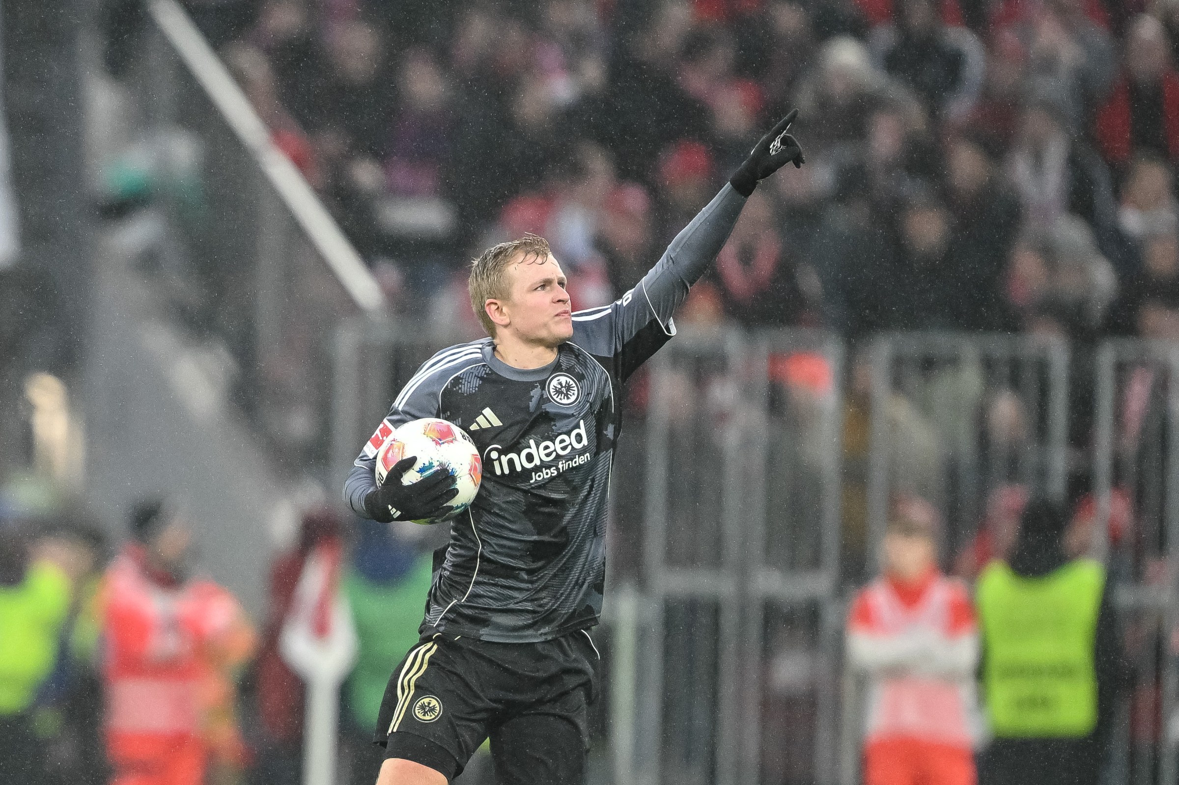 21 February 2026, Bavaria, Munich: Soccer: Bundesliga, Bayern Munich - Eintracht Frankfurt, Matchday 23, Allianz Arena. Jonathan Burkardt (Eintracht Frankfurt) celebrates after his goal to make it 3-1. Photo: Harry Langer/dpa - IMPORTANT NOTE: In accordance with the regulations of the DFL German Football League and the DFB German Football Association, it is prohibited to utilize or have utilized photographs taken in the stadium and/or of the match in the form of sequential images and/or video-like photo series. (Photo by Harry Langer/picture alliance via Getty Images)