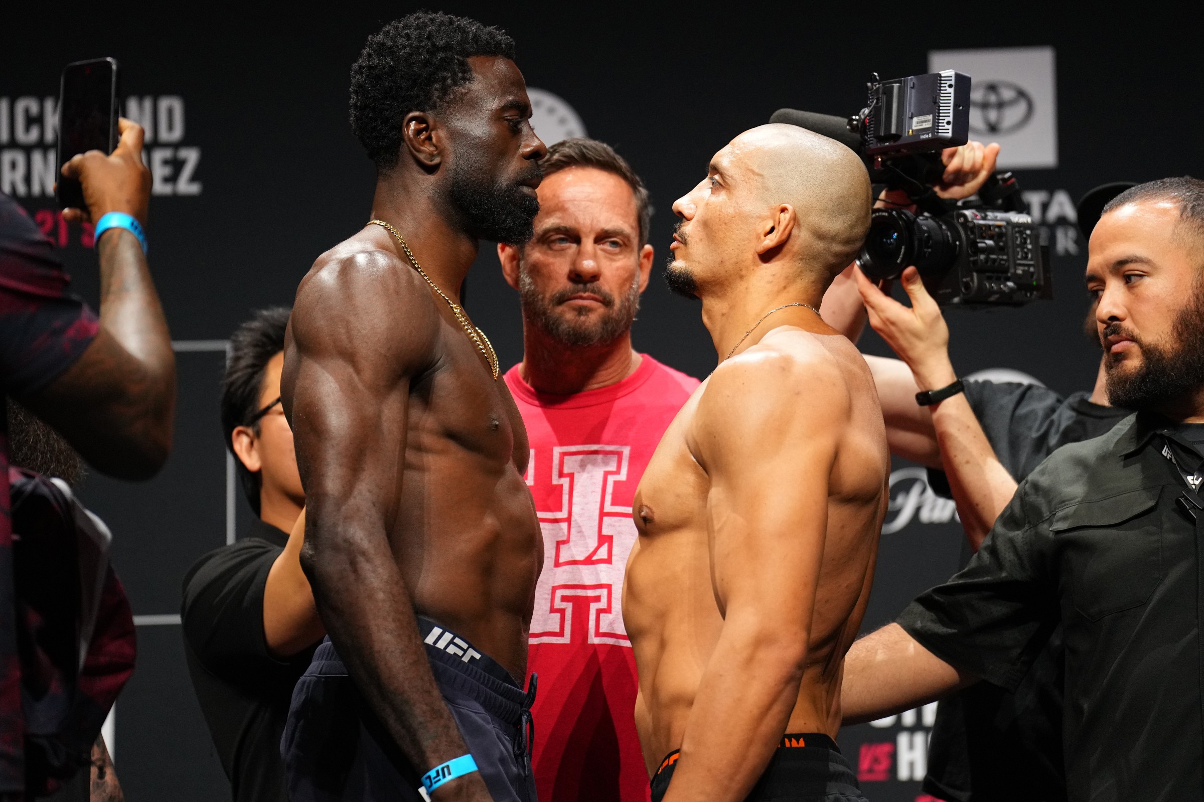 HOUSTON, TEXAS - FEBRUARY 20: (L-R) Chidi Njokuani and Carlos Leal of Brazil face off during the UFC Fight Night ceremonial weigh-in at Toyota Center on February 20, 2026 in Houston, Texas. (Photo by Chris Unger/Zuffa LLC)