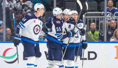 Perfetti scores in OT, Jets rally past Canucks