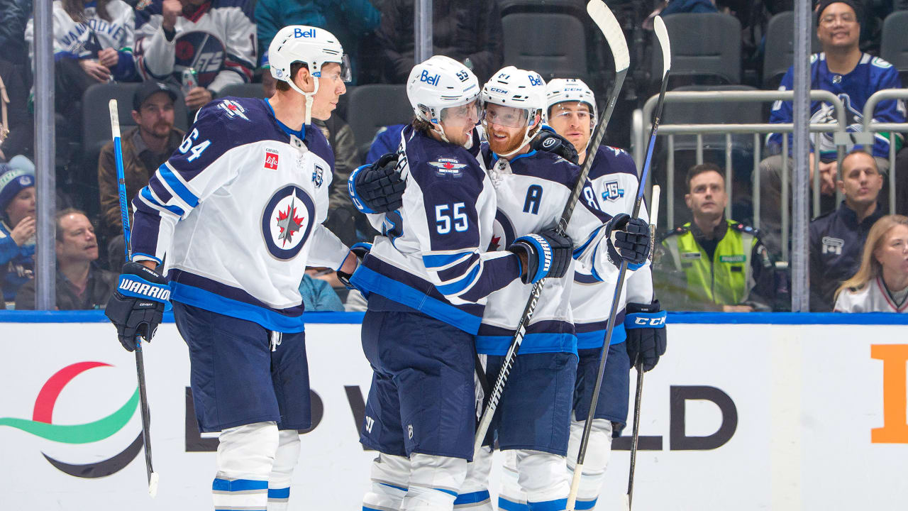 Perfetti scores in OT, Jets rally past Canucks