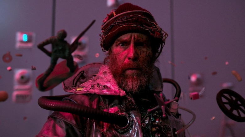 Sam Rockwell as the man, seeing something unbelievable in Good Luck Have Fun Don't Die