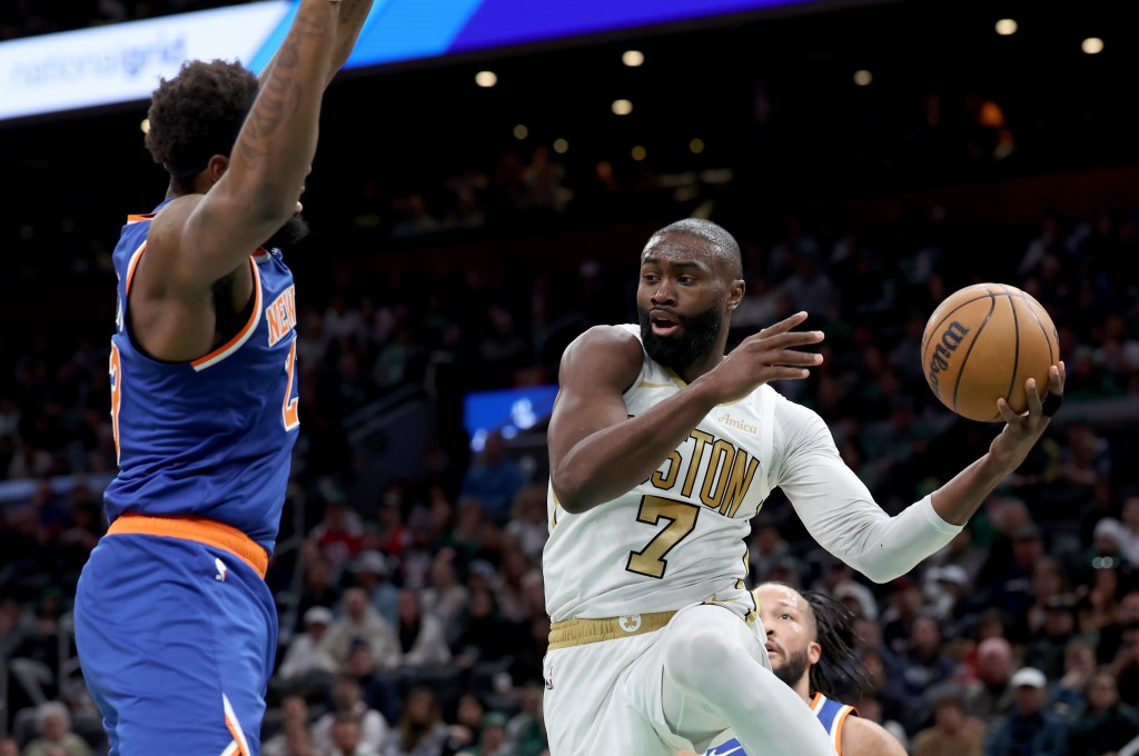 Boston Celtics guard Jaylen Brown (7) grabs a rebound.