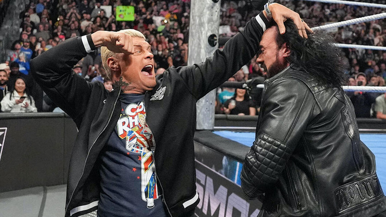 Cody Rhodes punches Drew McIntyre