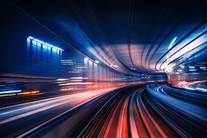 Dynamic Motion Blur Scene of a High-Speed Monorail in Tokyo at Night