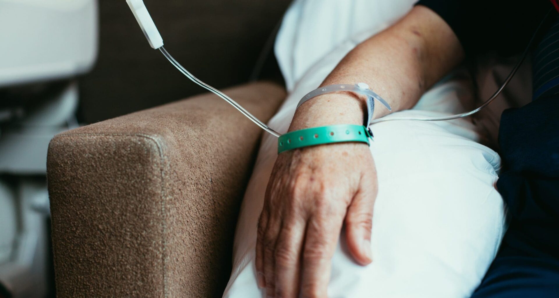 Old man patient hand in hospital