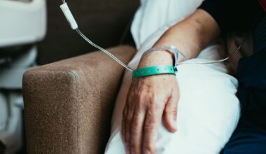 Old man patient hand in hospital