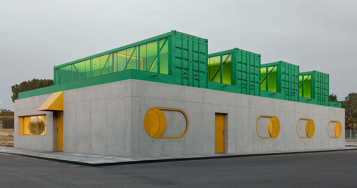 reworked shipping containers top colorful offices by impepinable studio