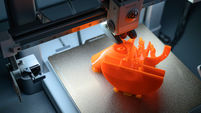 A 3D printer working on a design