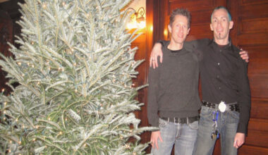 Joey Banis and Jeffrey Mundt in from of their Christmas tree months after the murder of Jamie Carroll in Murder in Glitterball City