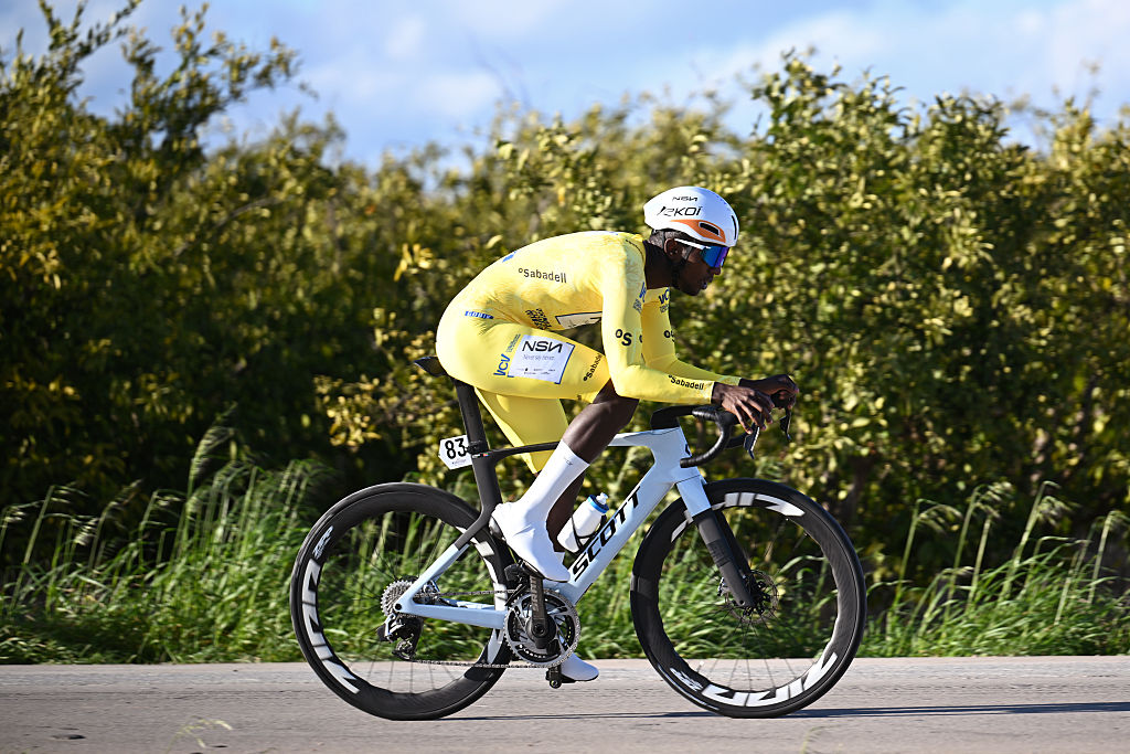 ALGINET, SPAIN - FEBRUARY 05: Biniam Girmay of Eritrea and NSN Cycling Team - Yellow Leader Jersey competes during the 77th Volta Comunitat Valenciana 2026, Stage 2 a 17km individual time trial stage from Carlet to Alginet on February 05, 2026 in Alginet, Spain. (Photo by Szymon Gruchalski/Getty Images)