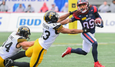 Montreal Alouettes' James Letcher Jr., (89) evades a tackle from Hamilton Tiger-Cats' Kyler Fisher (43) and Ante Milanovic-Litre (34) during second half CFL football action in Montreal, Saturday, Sept., 6, 2025.
