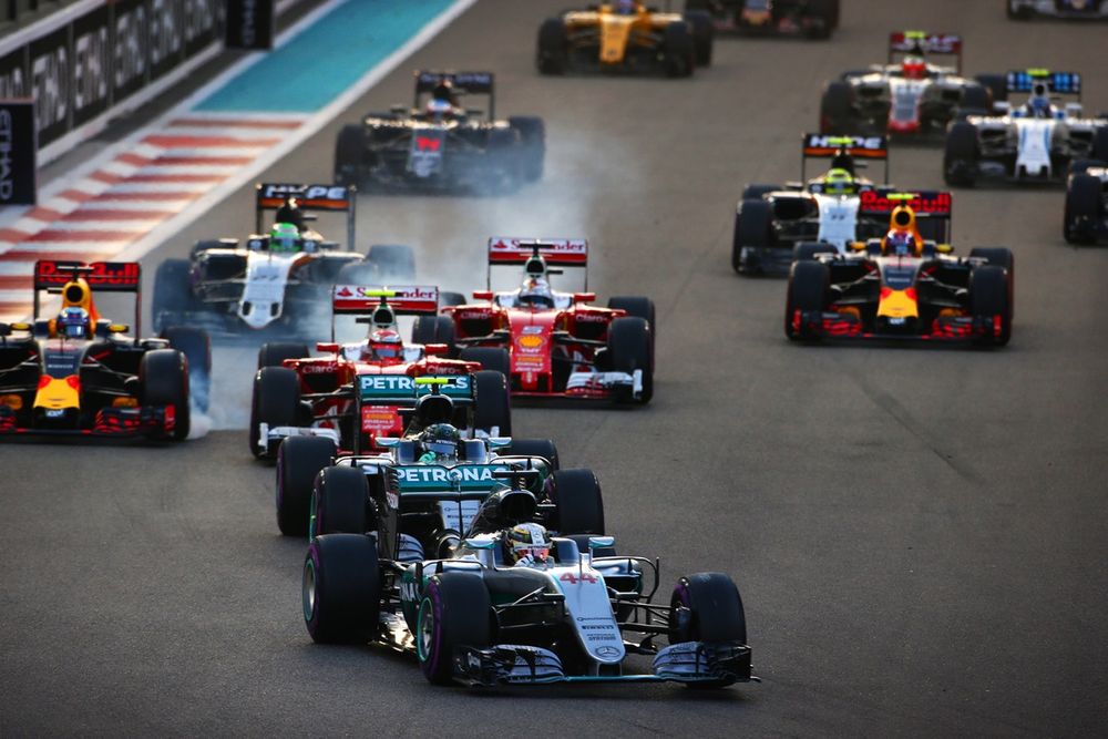 Lewis Hamilton, Mercedes leads Nico Rosberg, Mercedes