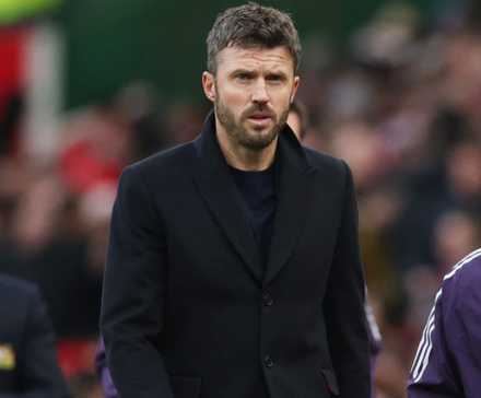 Manchester United caretaker manager Michael Carrick walks to his seat