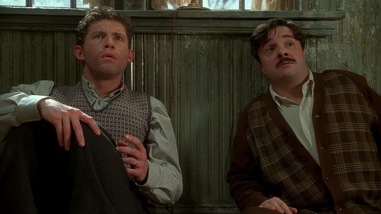 Lee Evans as Lars and Nathan Lane as Ernie, realizing they're being beaten by a mouse in MouseHunt
