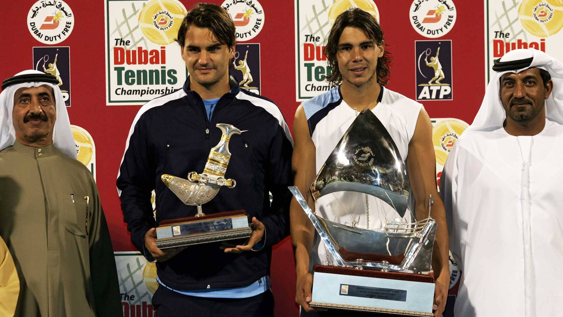 Roger Federer and Rafael Nadal during the trophy ceremony after the 2006 Dubai final.