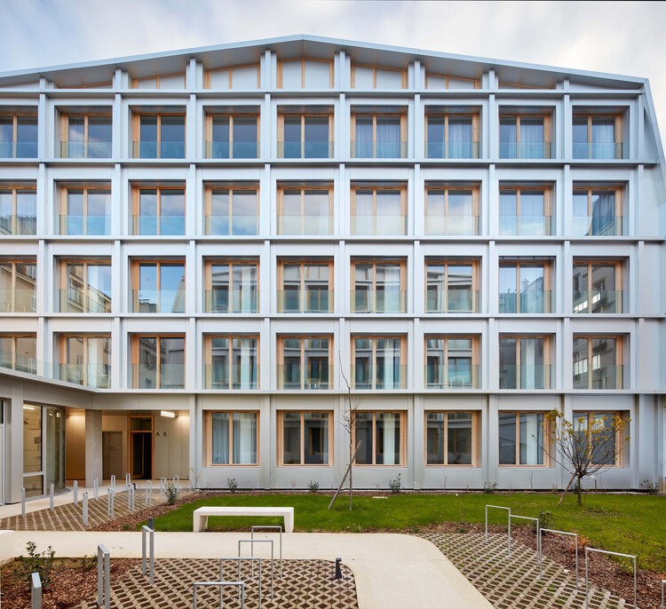 Parking Lot into Social Housing Residence / NZI Architectes - Image 1 of 29