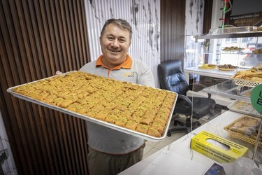 Kamaran Mawlood with pistachio baklava at his Kurdish bakery, Kamo Bakery, on Victoria Drive.