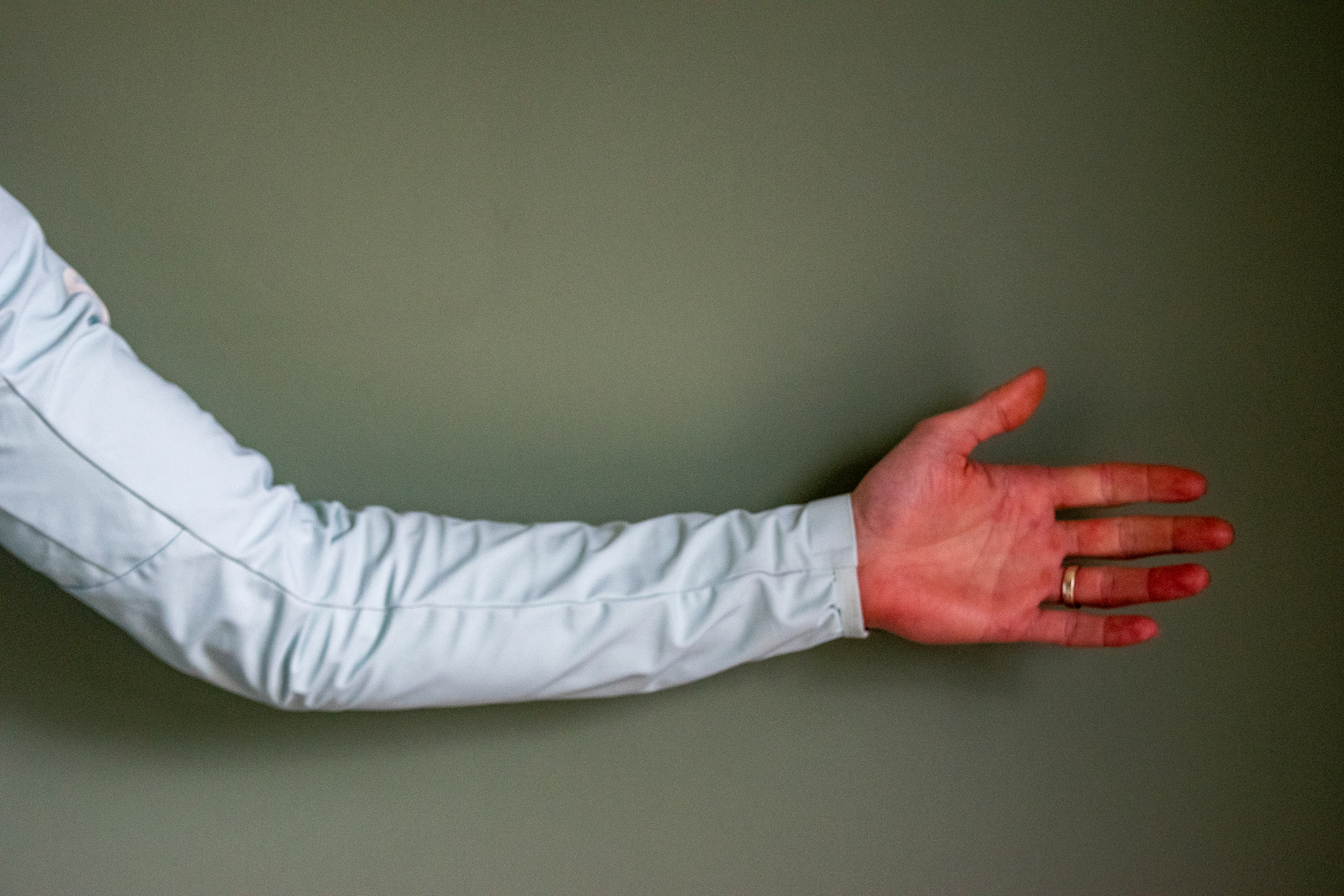 A man wearing a Rapha Shadow jersey