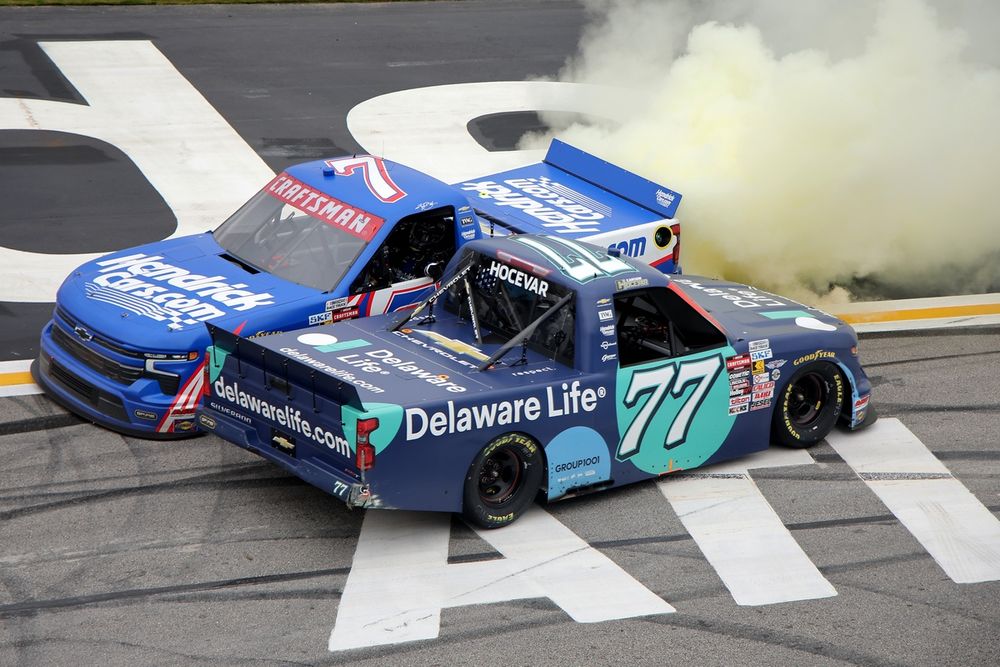 Race winner Kyle Busch and Carson Hocevar, Spire Motorsports Chevrolet